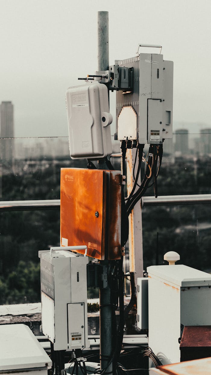 Mastering the First Impression: Your intriguing post title goes here Telecommunication devices on a rooftop in Xiamen, China, with cityscape background.